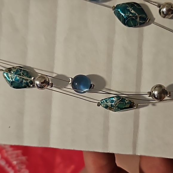 Green and silver necklace. Adjustable size. Great way to dress up an old outfit. - Picture 4 of 7